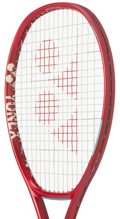 A close-up of the Yonex VCORE 98 Ruby Red 2026 Tennis Racket highlights its white strings with a red Yonex logo pattern in the center, engineered by Yonex for maximum spin.