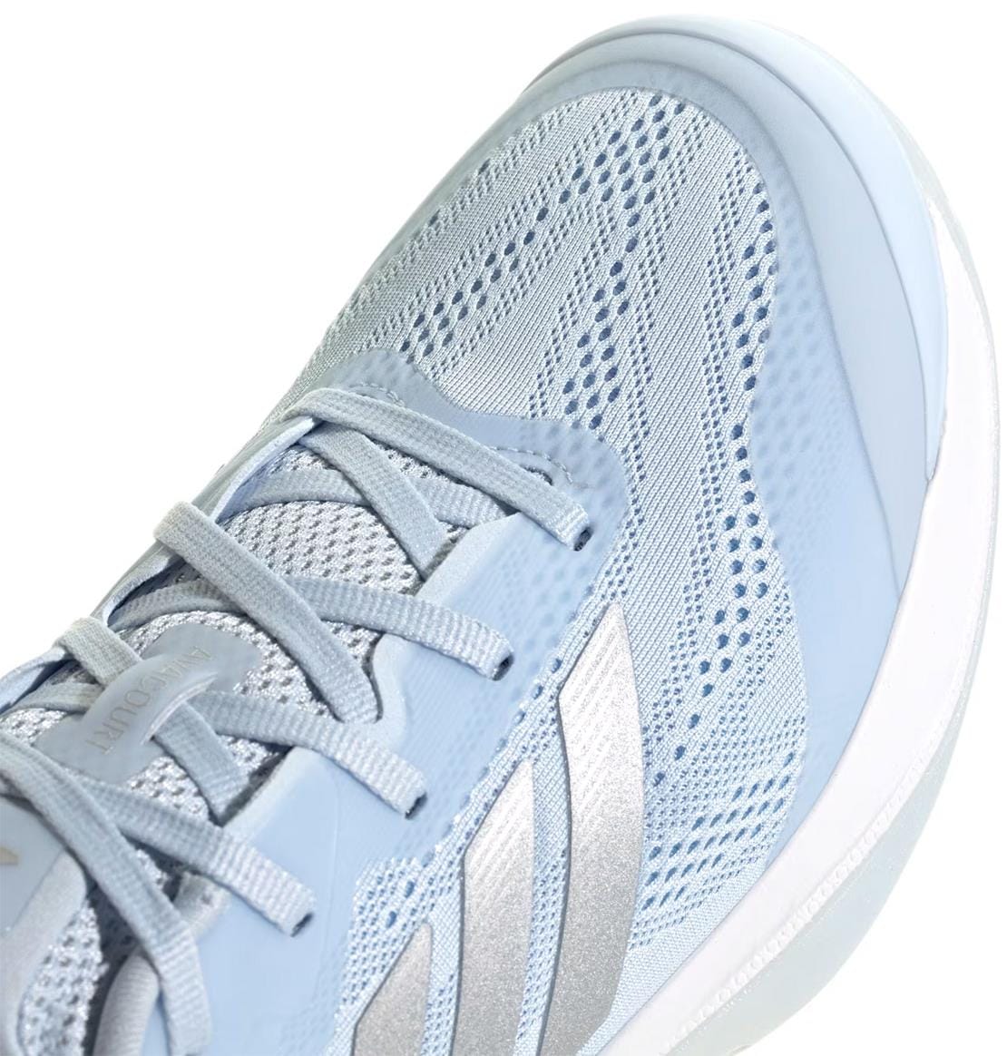 Close-up of adidas Avacourt 3 Women's Tennis Shoes in Crystal Sky/Silver Metallic/Cloud White, featuring light blue mesh, silver stripes, matching laces, and a white sole for a sleek, modern tennis court look.