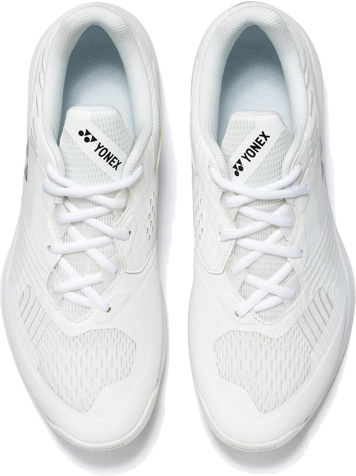The Yonex Power Cushion Sonicage Wide Unisex Tennis Shoes in white feature breathable mesh panels, white laces, and the Yonex logo on the tongue—offering lightweight style and comfort for every match.