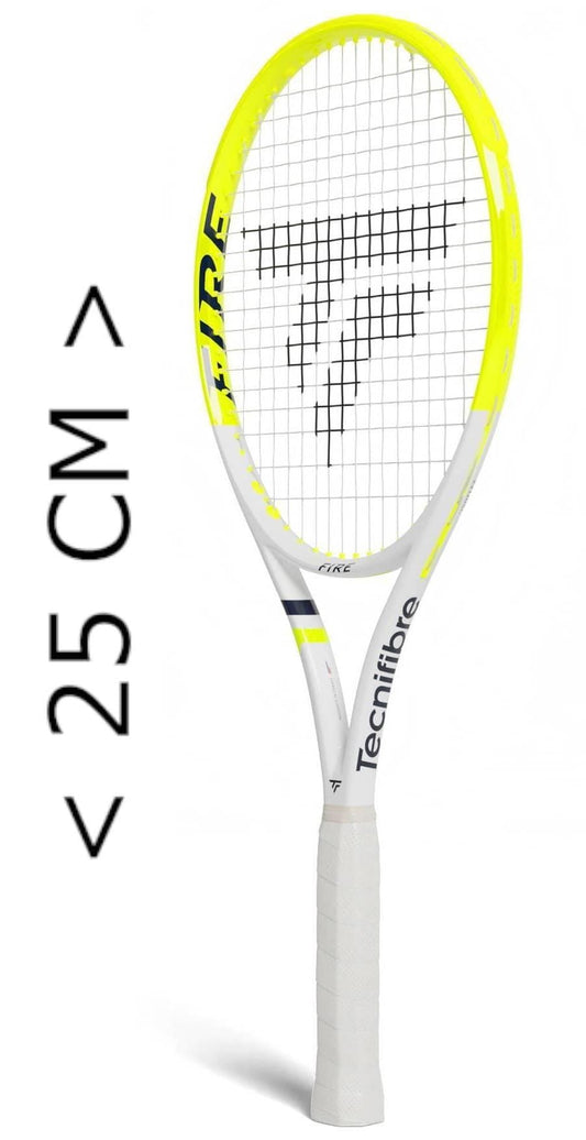A yellow and white Tecnifibre Fire Mini Tennis Racket by Tecnifibre stands upright beside a height marker, showing it measures under 25 cm tall.