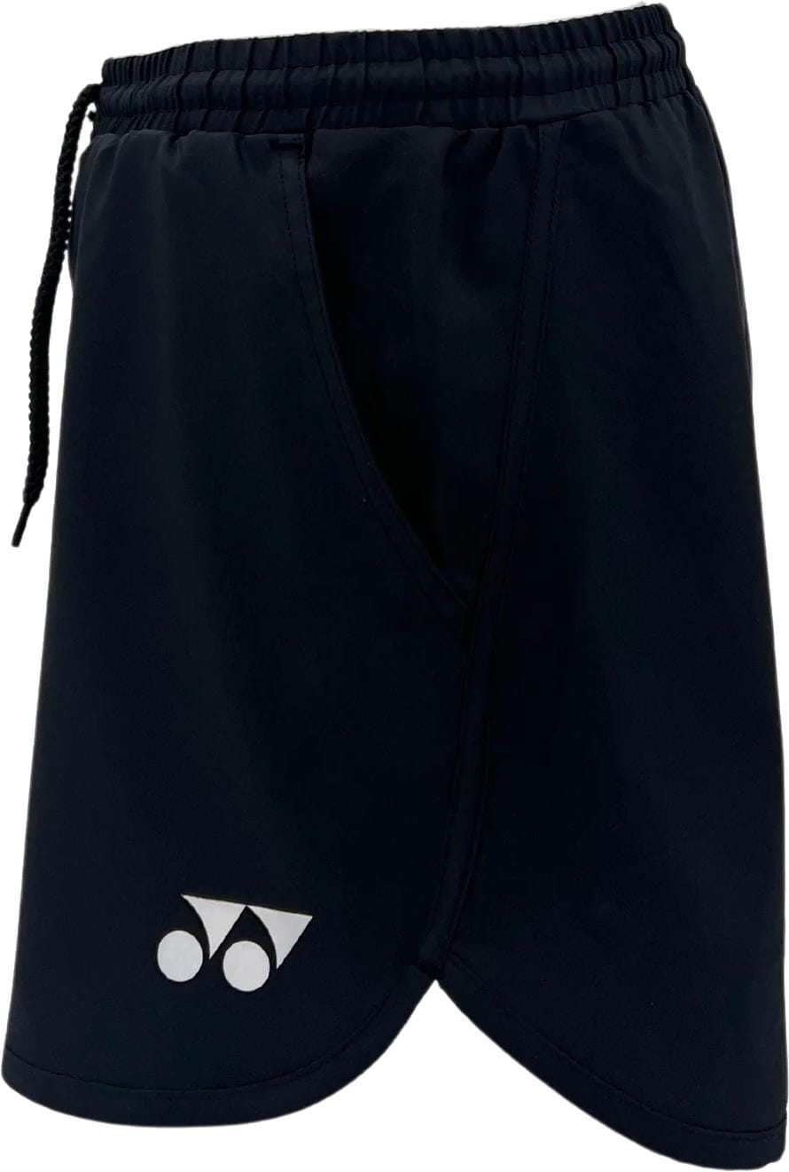 The Yonex YST2024 Womens Tennis Shorts in black feature an elastic waistband, drawstring, white Yonex logo on the lower left leg, and are made from breathable sports fabric for court comfort.
