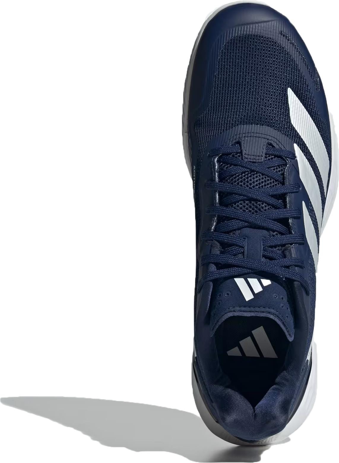 Top view of adidas Defiant Speed 2 Men’s Tennis Shoes in Dark Blue/Zero Metallic/Cloud White, featuring mesh upper, laces, and adidas logo on the tongue. Lightweight shoe casts a shadow on a white background.