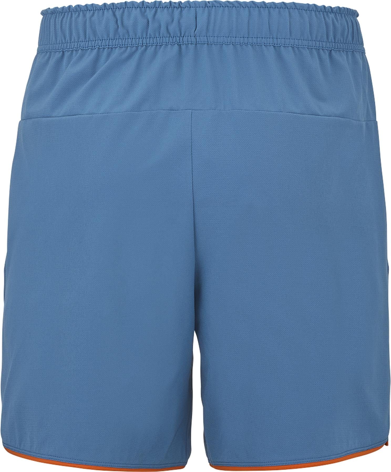 Babolat Perf Men's Tennis Shorts in Seaport blue feature an elastic waistband, thin orange hem lining, and lightweight fabric, making them ideal for sports or casual wear. Viewed from the back. Brand: Babolat.