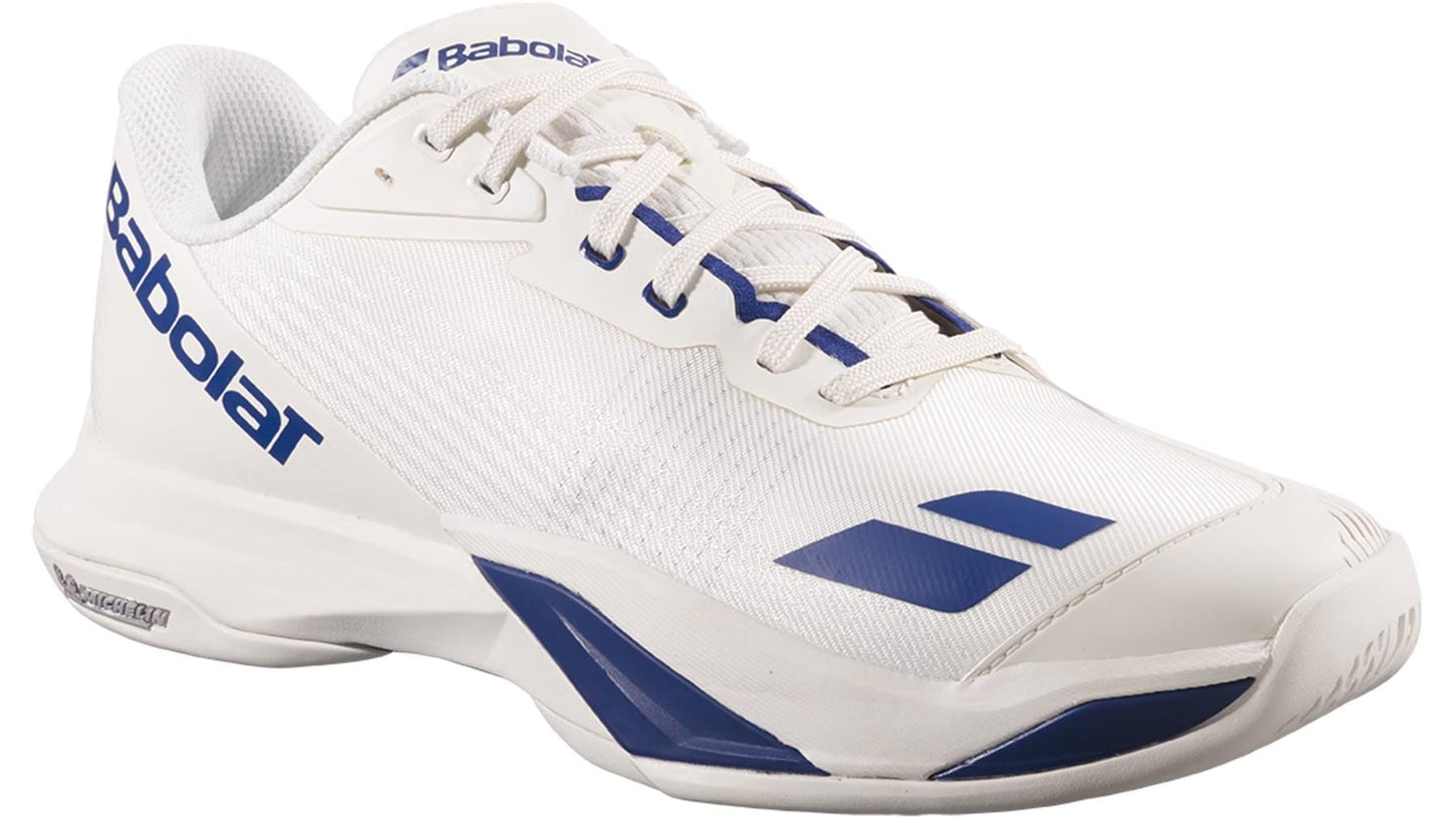 The Babolat Jet Mach 4 All Court Men's Tennis Shoes in Cream/Dark Blue feature a mesh upper, lace-up closure, Babolat branding on the side, and a textured rubber sole for agility and grip.