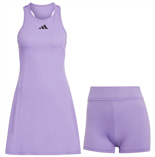 The adidas Womens Club Tennis Dress - Purple features a sleeveless design with a small black logo on the chest, crafted from Primegreen materials. This lilac sports dress includes matching shorts, offering both performance and style.