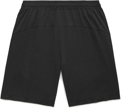 The Yonex 15239YX Knit Men's Tennis Shorts in black feature an elastic waistband and lightweight knit fabric, shown from the back. These Yonex shorts have a simple, plain design with no visible logos or patterns.