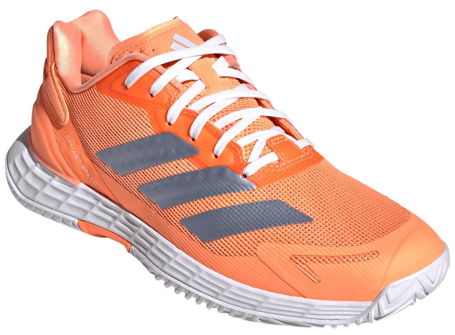 The ADIDAS Defiant Speed 2 Womens Tennis Shoes in orange by adidas are shown angled on a white background—ideal for those seeking lightweight tennis footwear.