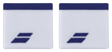 A pair of Babolat Logo Wristbands in white with sodalite blue accents featuring a textured surface and dark blue edging at the top. Each absorbent wristband displays a small blue geometric logo in the lower corner, ideal for keeping you comfortable on the court.