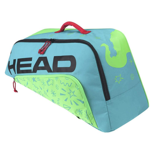 The HEAD Junior Combi Novak 6 Racket Tennis Bag in Blue and Green blends a vibrant color scheme with striking red zippers and handle. The brand name, "HEAD," is prominently displayed in black, complemented by abstract lighter green patterns that enhance its style. It features a Backpack Carry System inspired by the legendary comfort and functionality of Novak Djokovic’s style.