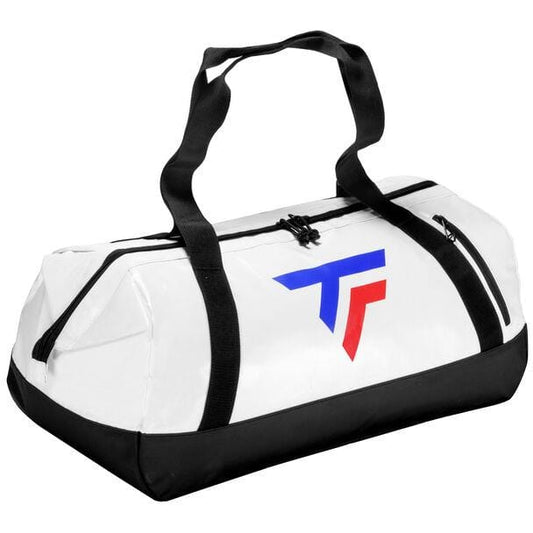 Presenting the Tecnifibre Tour Endurance 2023 Tennis Duffle Bag - White/Black by Tecnifibre, a stylish duffel with a convenient zipper and two sleek black handles. Its waterproof construction ensures durability, while the eye-catching blue and red logo on the side makes it an ideal choice for all your adventures.