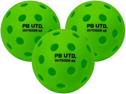 Three green Pickleball United Freedom 40 Outdoor Pickleball Balls are shown. Each ball, made by Pickleball United, is labeled "PB UTD. OUTDOOR 40" in black and designed with multiple holes for outdoor play. Set includes three balls.