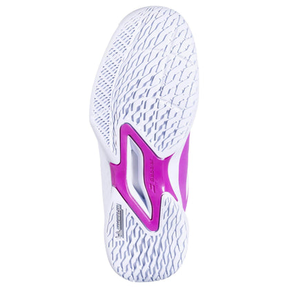 The image shows the sole of the Babolat Propulse Junior 3 Girls Tennis Shoes in Fandango Pink with textured grip, purple accents, and a cutout revealing "stability," highlighting its durable Michelin outsole.