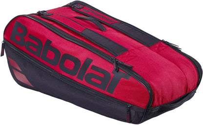 The Babolat Court L 9 Racket Tennis Bag in Burgundy and Black is crafted from recycled polyester and features a large logo, multiple zippered compartments, and convenient handles—designed to carry racquets and sports gear.