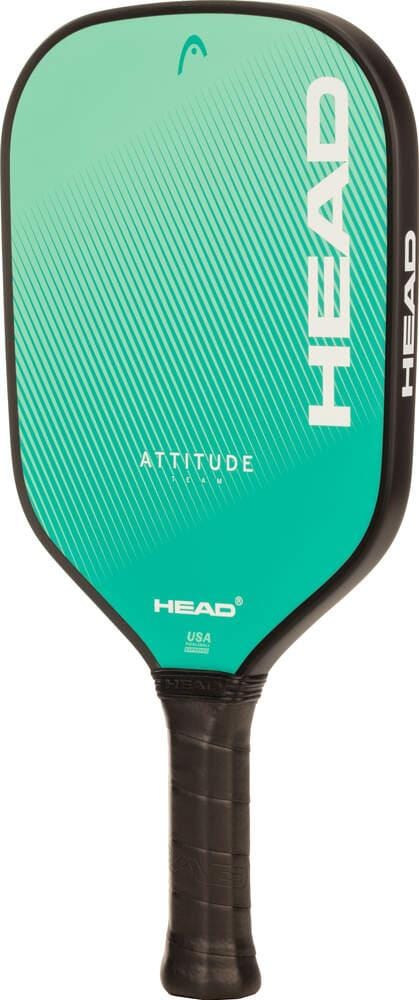 The HEAD Attitude Team Pickleball Paddle in black and mint features an ergonomic grip handle with white branding. “ATTITUDE” is printed at the center, making this paddle from HEAD a great choice for beginners.