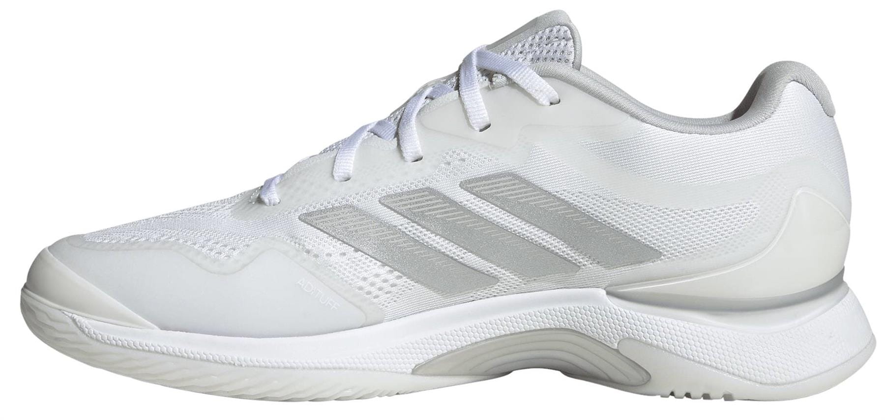 The adidas ADIDAS Avacourt 3 Womens Tennis Shoes in white feature light gray side stripes, a textured sole, and white laces. They are shown from the side against a plain background.