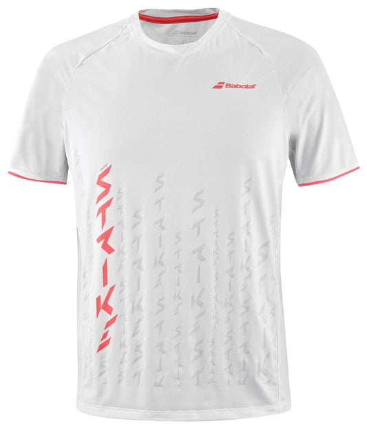 This Babolat Strike Men's Crew Neck Tennis T-Shirt in white showcases red accents on the sleeve edges, with "STRIKE" boldly printed in red vertically alongside transparent echoes. Designed with 360 Motion for enhanced flexibility, it features the iconic Babolat logo prominently on the left chest.