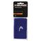 A blue HEAD 5" Tennis Wristband is packaged with the brand logo prominently displayed on the front. The packaging highlights "HEAD" and "WRISTBAND," while the phrase "SWEAT ABSORPTION" stands out in orange text against a sleek black background.