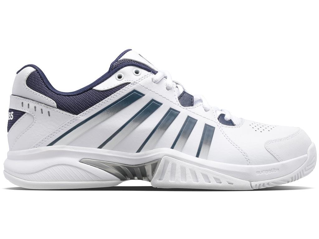 The K-Swiss Receiver V Men's Tennis Shoes in White, Peacoat, and Silver are designed with dark blue accents and feature performance-oriented parallel blue stripes on the sides. These shoes have a textured sole with ample cushioning and a low-top design, making them ideal for both sports and casual wear.