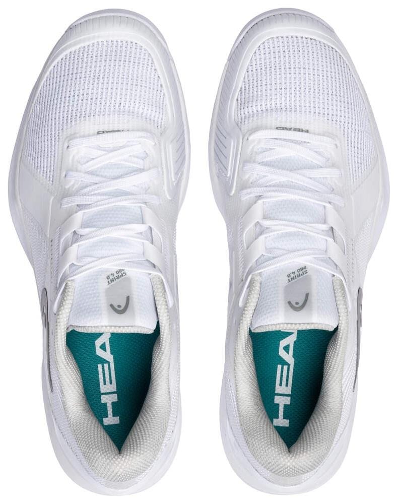 Top view of HEAD Sprint Pro 4.0 Mens Grass Court Tennis Shoes in White/Grey, featuring mesh uppers, white laces, and teal Ortholite® insoles with bold white "HEAD" branding, displayed side by side on a white background.