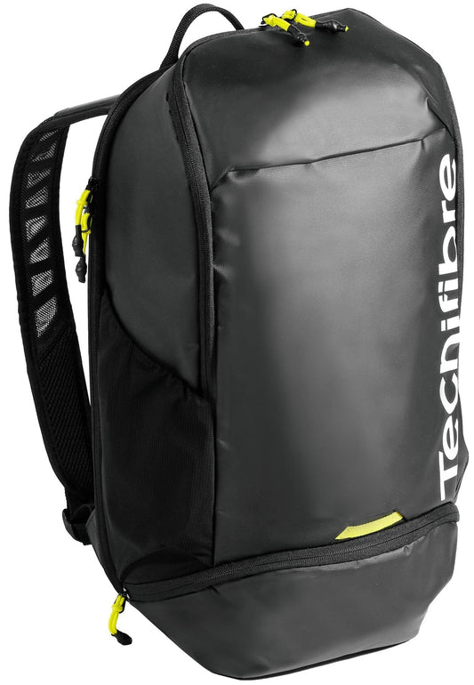 The Tecnifibre Reform Tennis Backpack - Black features yellow zippers, a spacious front compartment, padded shoulder straps, side pockets, and a white Tecnifibre logo—ideal for carrying your tennis gear in style.