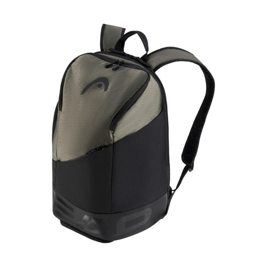 The HEAD Pro X Tennis 28L Backpack - TYBK showcases a sleek black and gray design, accompanied by a subtle logo at the front. It includes adjustable shoulder straps, a top handle, and a padded compartment for rackets. The backpack's modern appearance is further enhanced by an integrated shoe compartment and the prominently displayed HEAD brand name on the bottom front.