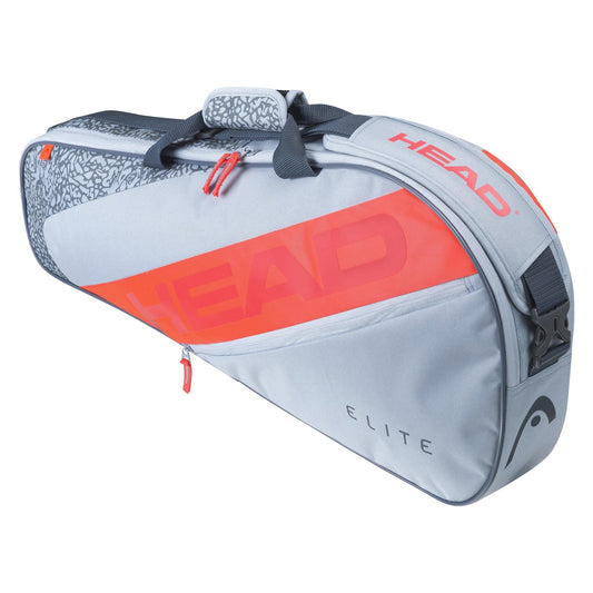 The HEAD Elite 3R 3 Racket Tennis Bag in Grey/Orange prominently features the "HEAD" logo. It includes a main compartment for rackets, a side pocket with an eye-catching pattern, and a convenient top handle. The word "ELITE" is stylishly printed near the bottom.