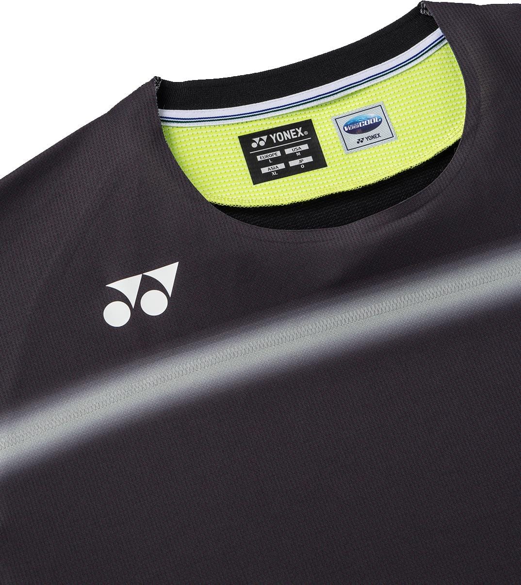 Close-up of the Yonex 10711YX Crew Neck Men's Tennis T-Shirt in black with a white logo, gray stripes, moisture-wicking fabric, bright yellow collar interior, and Yonex branding tags.