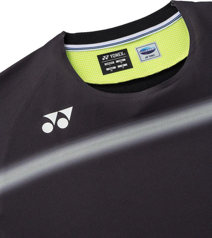 Close-up of the Yonex 10711YX Crew Neck Men's Tennis T-Shirt in black with a white logo, gray stripes, moisture-wicking fabric, bright yellow collar interior, and Yonex branding tags.