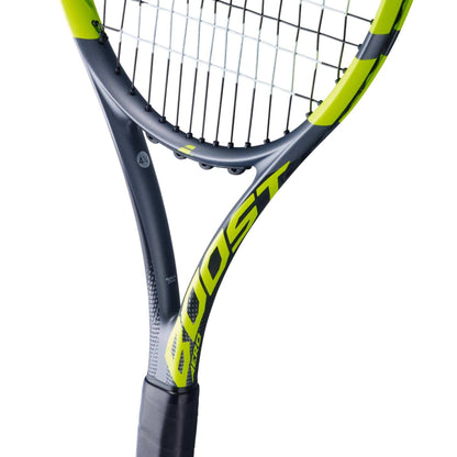 Close-up of the Babolat Boost Aero 2026 Tennis Racket by Babolat, showing its black and bright yellow frame, visible strings, and handle—an entry-level racket isolated on a white background.