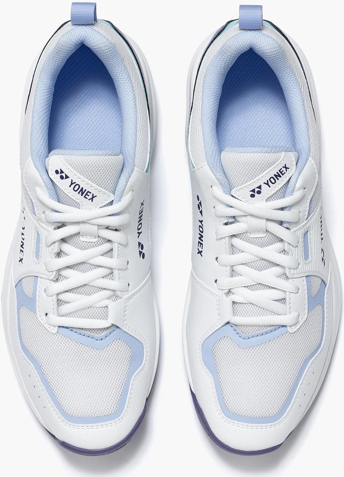 A pair of Yonex Pro-Move Classic Men's Tennis Shoes in White/Sax, shown from above, features lightweight mesh uppers, white laces, Yonex logos on the tongue and side, and Power Cushion technology for superior comfort.