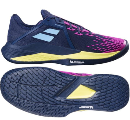 A side and bottom view of the Babolat Propulse Fury 3 2024 Men's Tennis Shoes in Dark Blue and Pink Aero highlights their sleek athletic design. These tennis shoes feature a textured sole for enhanced grip, yellow accents, and a prominent logo on the side. The intricate patterns provide superior traction, while excellent shock absorption makes them ideal for athletes.