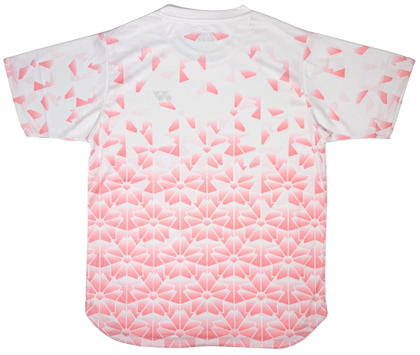 The Yonex YTM2025B Men's Tennis T-Shirt in white features pink geometric designs that transition from subtle shapes to bold florals. This quick-dry Yonex shirt combines comfort and style for on-court performance.