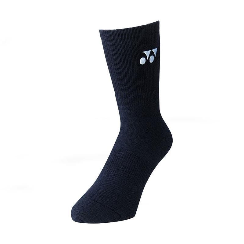 The Yonex 19120EX 3D ERGO Crew Tennis Socks in navy blue are designed with an ergonomic fit for superior cushioning. Featuring a small logo near the top, these socks flawlessly merge comfort and style. Displayed upright against a plain white background, they exude both functionality and elegance.