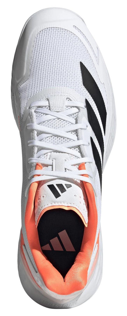 Top view of adidas Defiant Speed 2 Men’s Tennis Shoes in white and orange, with black stripes, orange inner lining, white laces, and a black adidas logo on the tongue—engineered for lightweight performance.