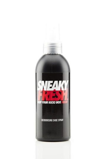 A black pump bottle of Sneaky Fresh Shoe Deodorant by Sneaky, adorned with a white cap. The label displays bold white and red text, "Sneaky Fresh: Keep Your Kicks Box Fresh!" on a simple white background, effectively removing odors to maintain your footwear's pristine condition.