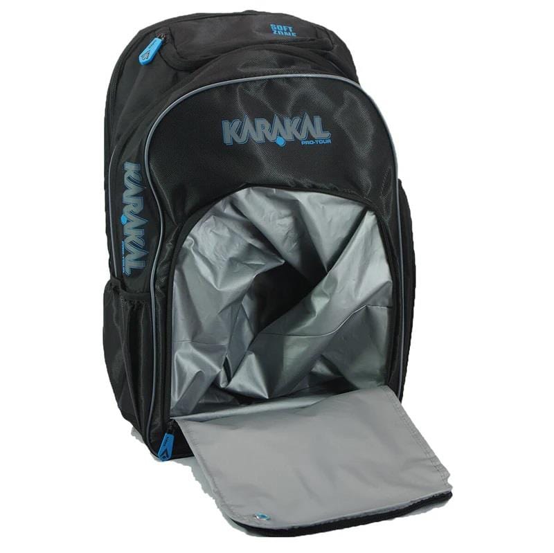 The Karakal Pro Tour 30 2.1 Tennis Backpack - Black / Blue is displayed with its main compartment open, revealing a gray interior and offering a generous 30-litre capacity. Highlighted with blue accents and branding, it includes multiple zippered pockets for storage and padded shoulder straps for added comfort.