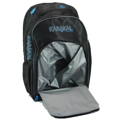 The Karakal Pro Tour 30 2.1 Tennis Backpack - Black / Blue is displayed with its main compartment open, revealing a gray interior and offering a generous 30-litre capacity. Highlighted with blue accents and branding, it includes multiple zippered pockets for storage and padded shoulder straps for added comfort.