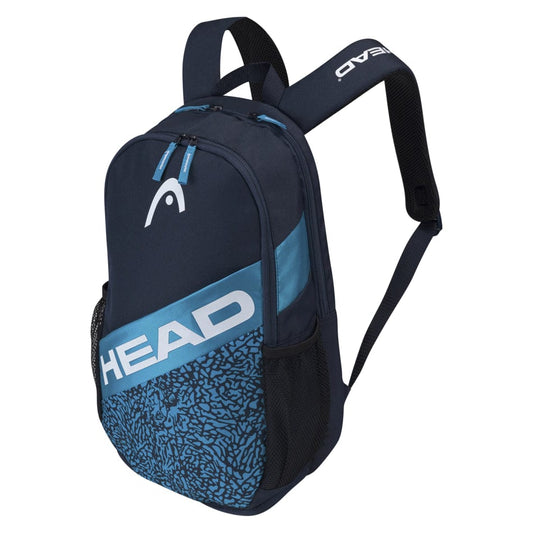 The HEAD Elite Tennis Backpack in Blue Navy, branded with a large "HEAD" logo in white and light blue on the front, offers a spacious main compartment, side mesh water bottle pockets, and padded shoulder straps. It also features a textured pattern design on the lower front pocket, ideal for organizing essentials.