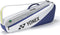 The Yonex BA52523EX Club 3 Racket Tennis Bag in white/blue features a zipper, carrying handle, shoulder strap, and Yonex branding. This lightweight bag securely holds up to 3 rackets.