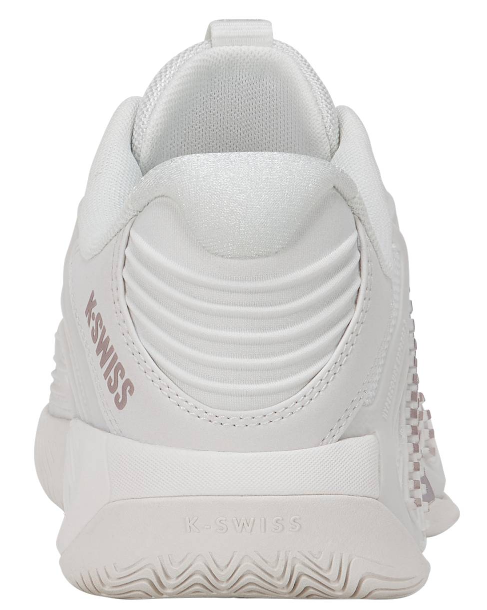 The K-Swiss Hypercourt Express 3 Womens Tennis Shoes in White / Rose Gold are pictured from the back, showcasing ribbed heel detailing, a textured sole, and bold "K-SWISS" branding on both the heel and midsole—ideal for those seeking stylish yet high-performance tennis shoes.