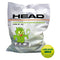 The image features a product from HEAD, specifically the "HEAD TIP Tennis Balls (72 Pack) - Green." Displayed is a white bag labeled for advanced beginners aged 9-10, adorned with a cartoon green monster holding a tennis racket. Also prominently shown is the "T.I.P." logo for the Tennis Instruction Program, highlighting these pressureless tennis balls as ideal for kids' tennis.
