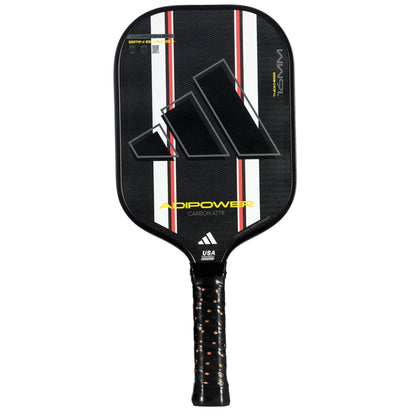 The adidas Adipower Carbon ATTK 3.3 Pickleball Paddle in black/white features white and red stripes, a large Adidas logo, a textured grip handle with orange specks, and is designed for advanced-level play.