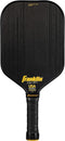 The Franklin Carbon STK 17mm Pickleball Paddle features a black textured surface, yellow "Franklin" logo, "USA Pickleball Approved" text above the black grip, and is officially USAPA approved.