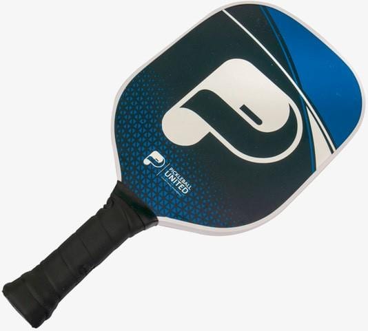 The Pickleball United Freedom Pickleball Paddle in black and blue features a black grip, large white “P” logo, geometric design, Polypropylene Honeycomb Core, and durable fiberglass hitting surface.