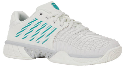 The K-Swiss Express Light 3 Women's Tennis Shoes in White, Baltic, and Glacier Gray feature a ribbed, molded upper design with textured soles and teal (Baltic) accents, including signature stripes on the side. These shoes offer added durability with DuraWrap Flex technology and display the K-Swiss logo on the tongue.