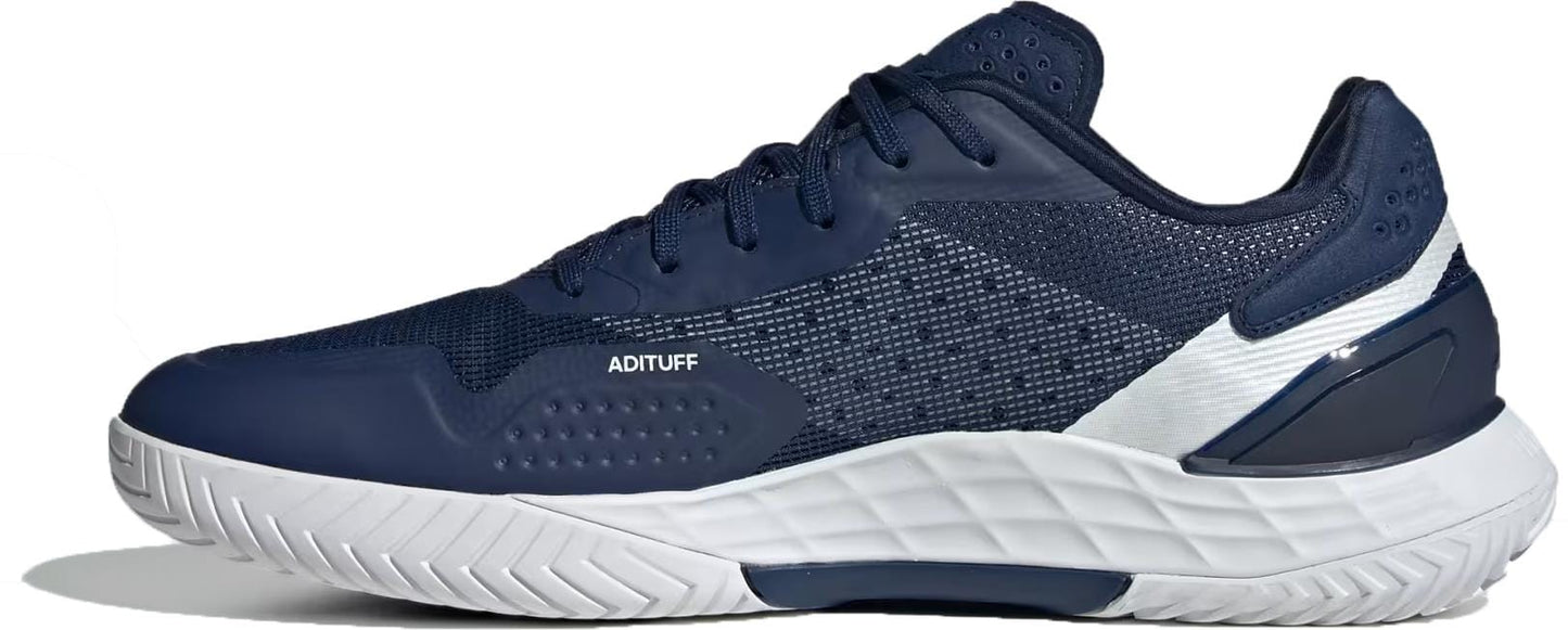 The adidas ADIDAS Defiant Speed 2 Men’s Tennis Shoes feature a dark blue mesh and synthetic upper, laces, a textured white sole, “ADITUFF” on the side, and white plus zero metallic accents on the heel and midsole.