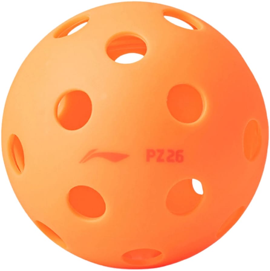 A Li-Ning PZ26 Indoor Training Pickleball Ball (3 Ball) in high-visibility orange, featuring several large holes and the “PZ26” marking on the side, is shown on a white background.