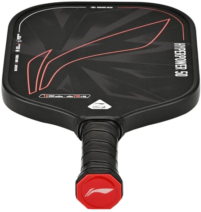 The Li-Ning HyperPower 50 Pickleball Paddle features a bold black design with red geometric accents, showcasing the “HYPERION CFS 16” label. Built for enhanced power, it boasts a carbon fibre face and a 16mm polypropylene honeycomb core. A wrapped black handle and red hexagonal end cap with a white logo complete this high-performance Li-Ning paddle’s striking appearance.