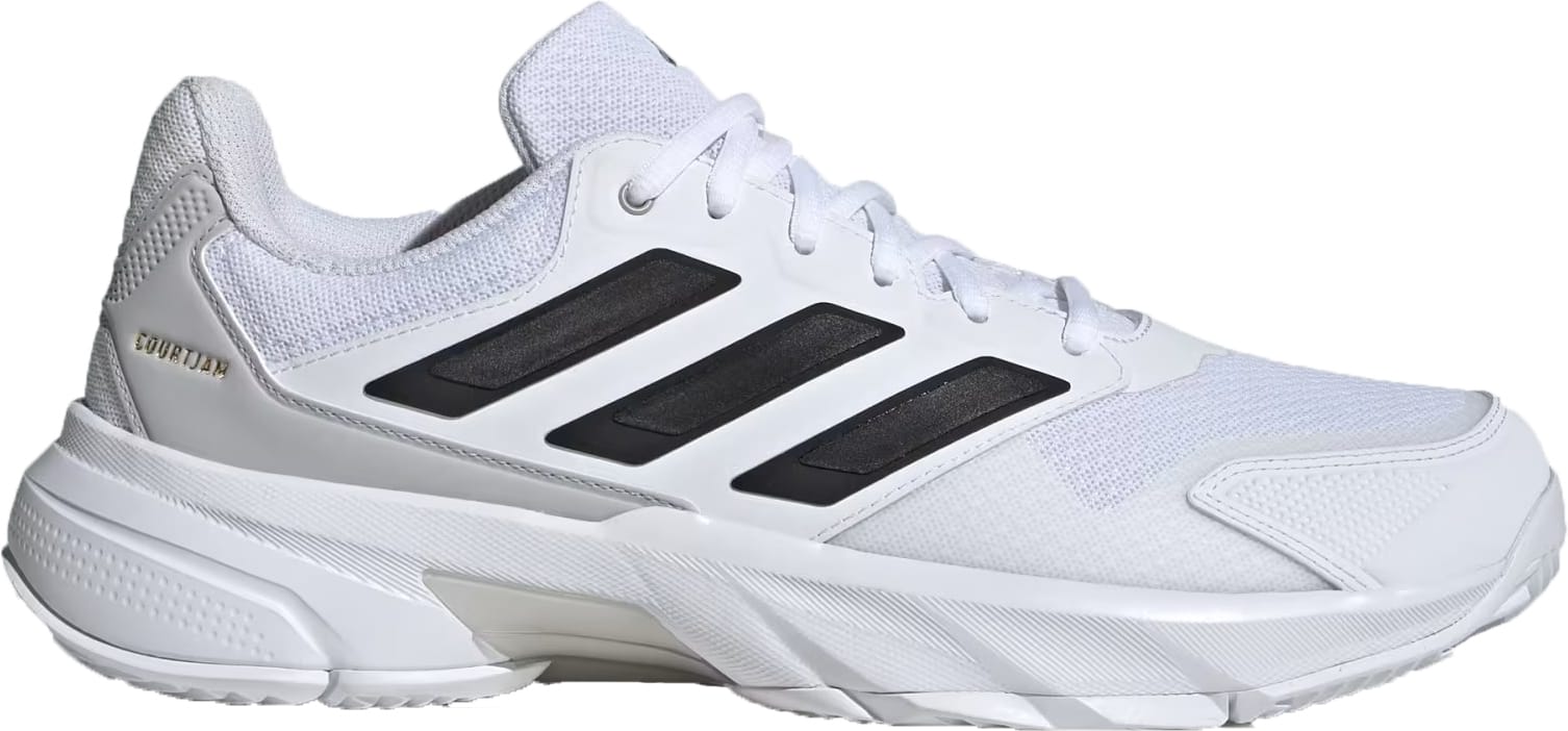The adidas CourtJam Control 3 Men’s Tennis Shoes in Cloud White/Core Black/Grey feature black stripes, a mesh upper, textured sole, and heel branding. This low-cut sneaker delivers court stability—ideal for hardcourt performance.
