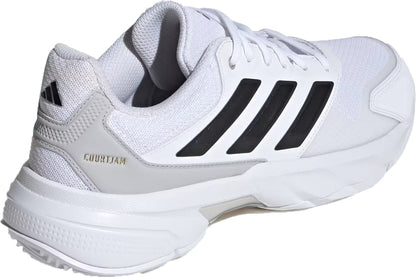 The adidas CourtJam Control 3 Men's Tennis Shoes in Cloud White/Core Black/Grey feature black stripes, grey accents, "COURT JAM" gold lettering at the heel, a textured sole for stability, and a mesh upper for breathability.